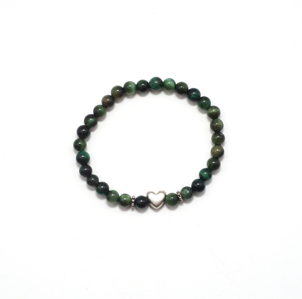 Green camo bracelet with silver heart at the middle. 